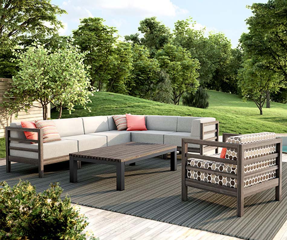 A photo of an outdoor patio sectional with blocky cushions and a matching coffee table displays the furniture quality. A matching chair with circular patterned fabric faces the sectional in the outdoor setting.