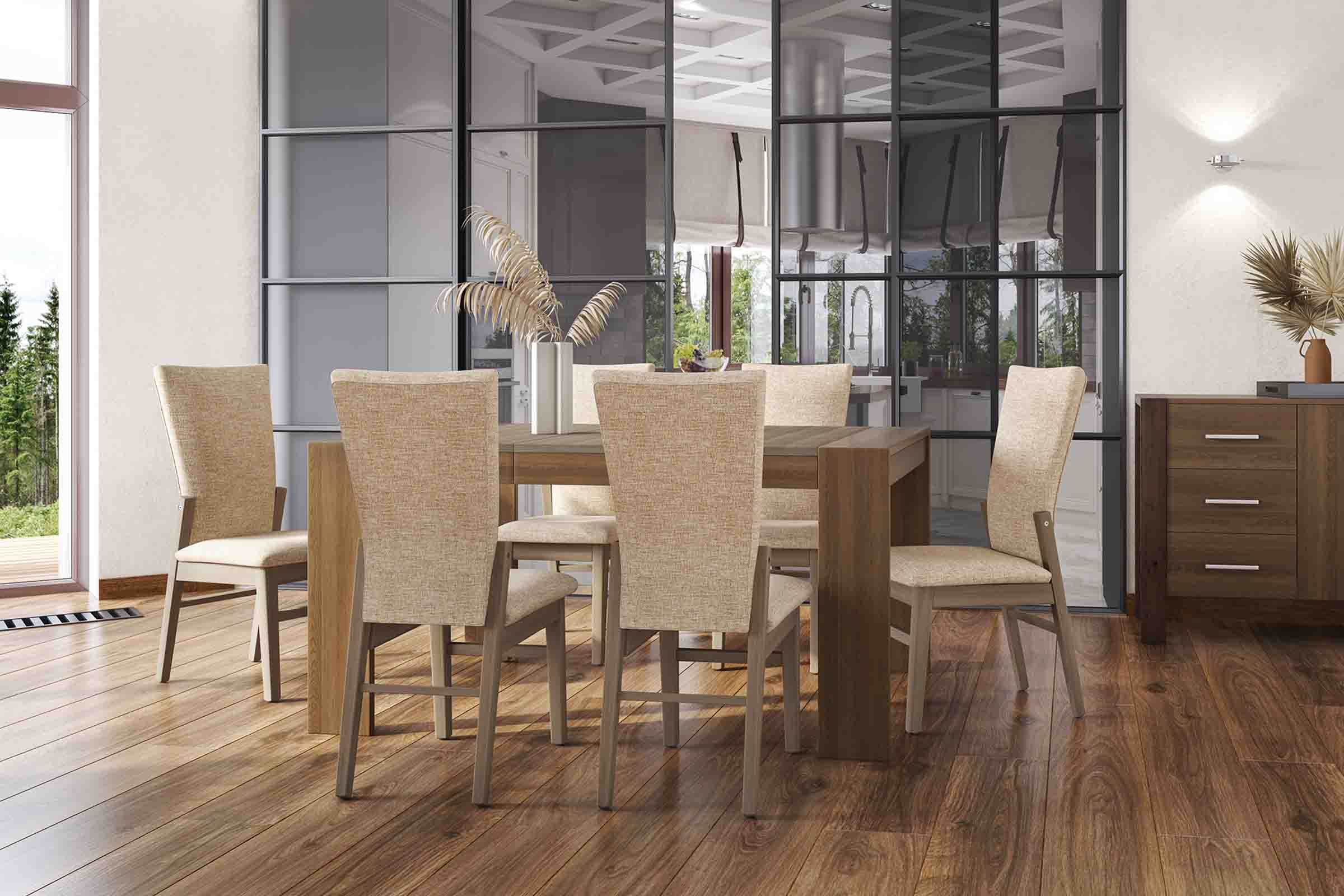 A dark stained wooden dining table with six farm style chairs is exhibited in a naturally lit dining room.